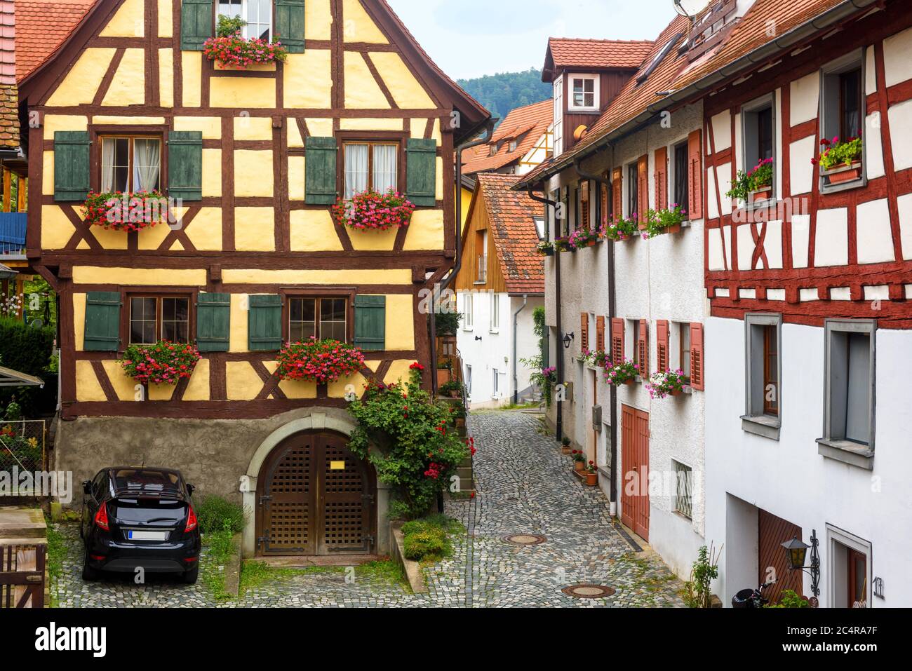 Old Half Timbered Houses In South Germany Beautiful Typical Houses In German Village Vintage Narrow Street In Summer Traditional Style District In Stock Photo Alamy Old Half Timbered Houses In South Germany Beautiful Typical Houses In German Village Vintage Narrow Street In Summer Traditional Style District In Stock Photo Alamy