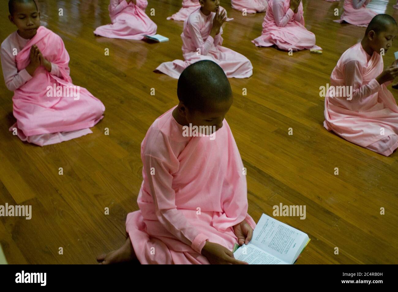 6pm Prayers At Sakya Dhi Ta Pali Daughter Of Buddha Nunnery Sagaing Hills Prayers Include Introductory Prayer To Buddha Metta Sutta Discourse Of Loving Kindness Vatta Sutta Discourse Of The Quail And Mora alamy