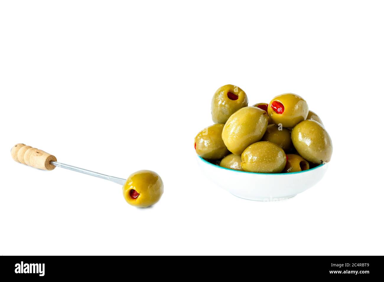 Green olives with pimento on white background Stock Photo Alamy