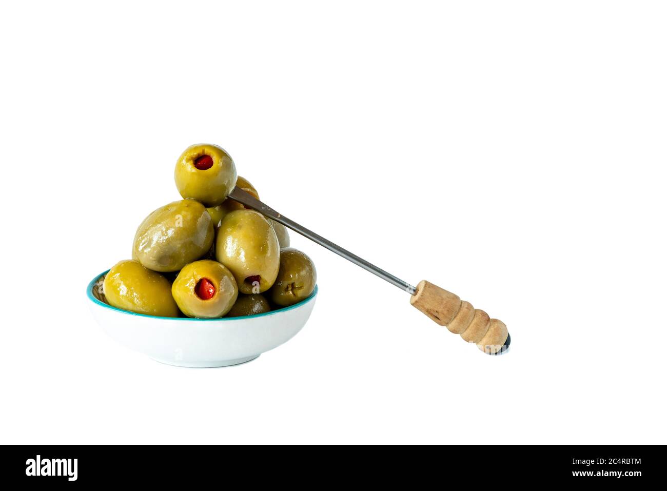 Green olives with pimento on white background Stock Photo Alamy