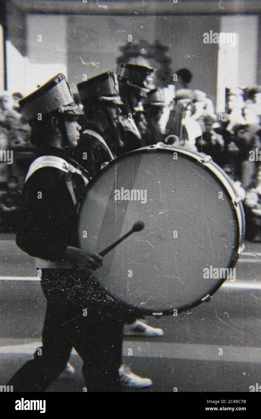 Fine 70s vintage black and white photography of a high school band on parade in downtown Chicago, Illinois. Stock Photo