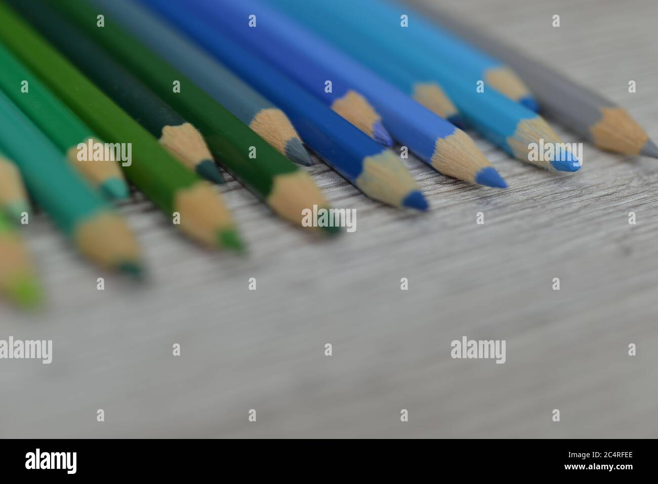 Rainbow Colored Pencils Lined Up on White Background Photograph by Ocean  Breeze - Pixels