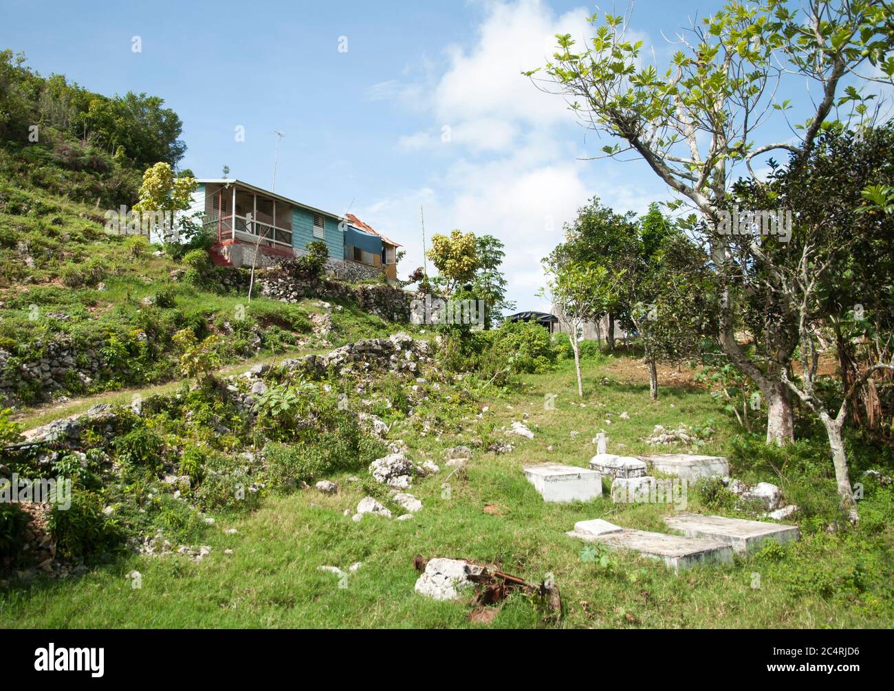 Nine Mile village with a little cemetery on a side of the road, the