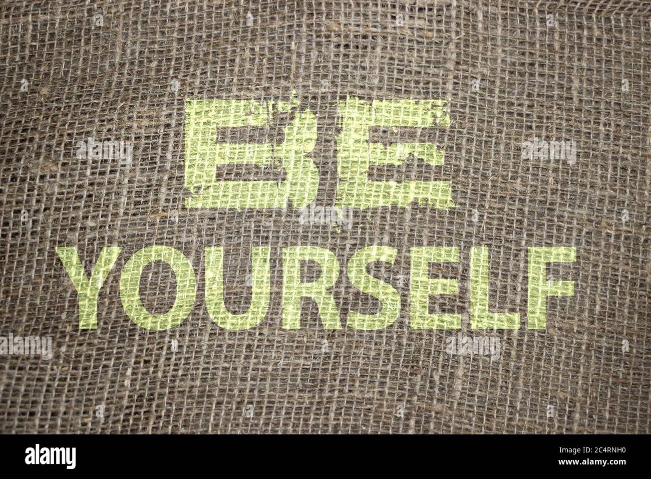 Be yourself text on brown burlap. Retro burlap background vintage country rustic style. Motivation business or career concept Stock Photo