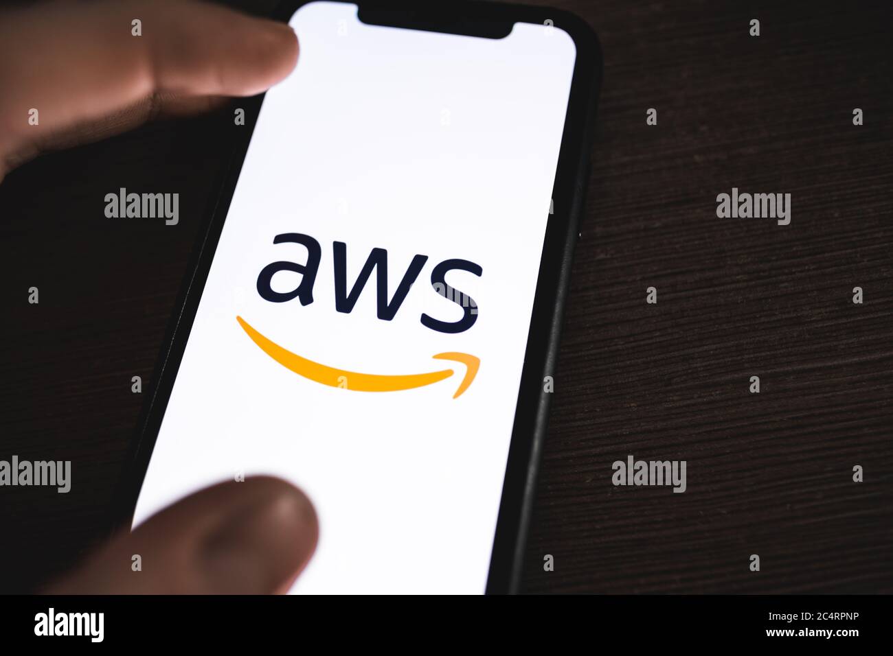 Amazon Web Services logo on the smartphone screen. Stock Photo