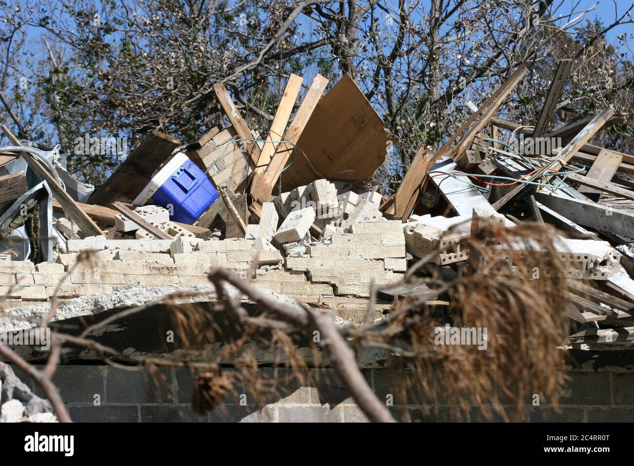 Powerful Hurricane Katrina storm surge & wind damage left pile of rubbish on beach in Ocean
