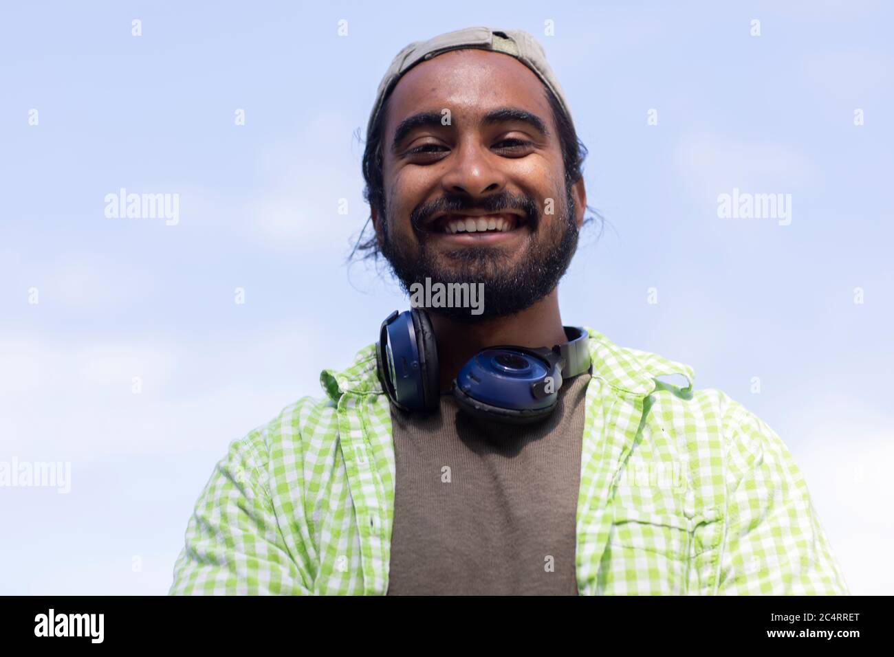 Man in cap standing hi-res stock photography and images - Alamy