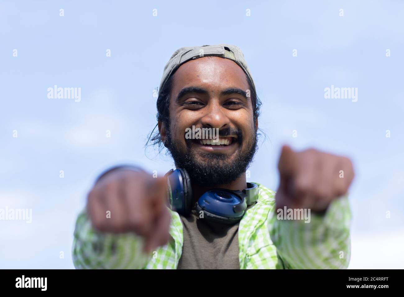 Man in blue shirt showing hi-res stock photography and images - Alamy