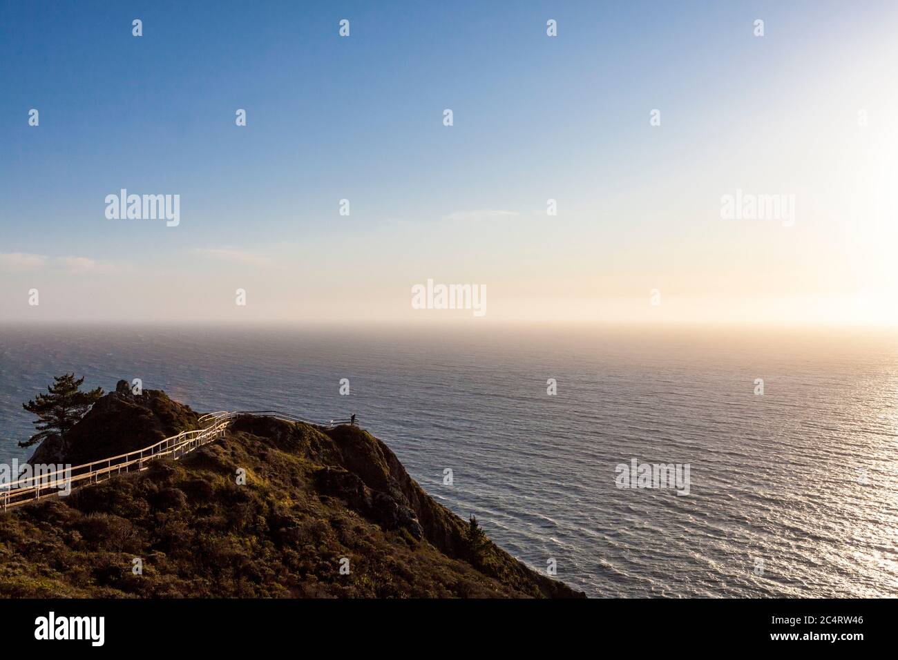 Woman admiring scenic coastal hi-res stock photography and images - Alamy