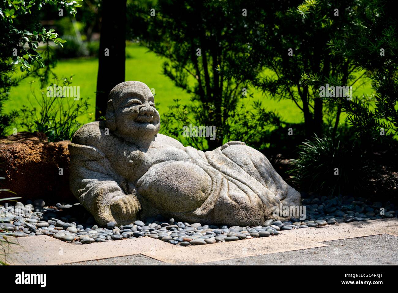 Buddha Statue in a garden Stock Photo - Alamy