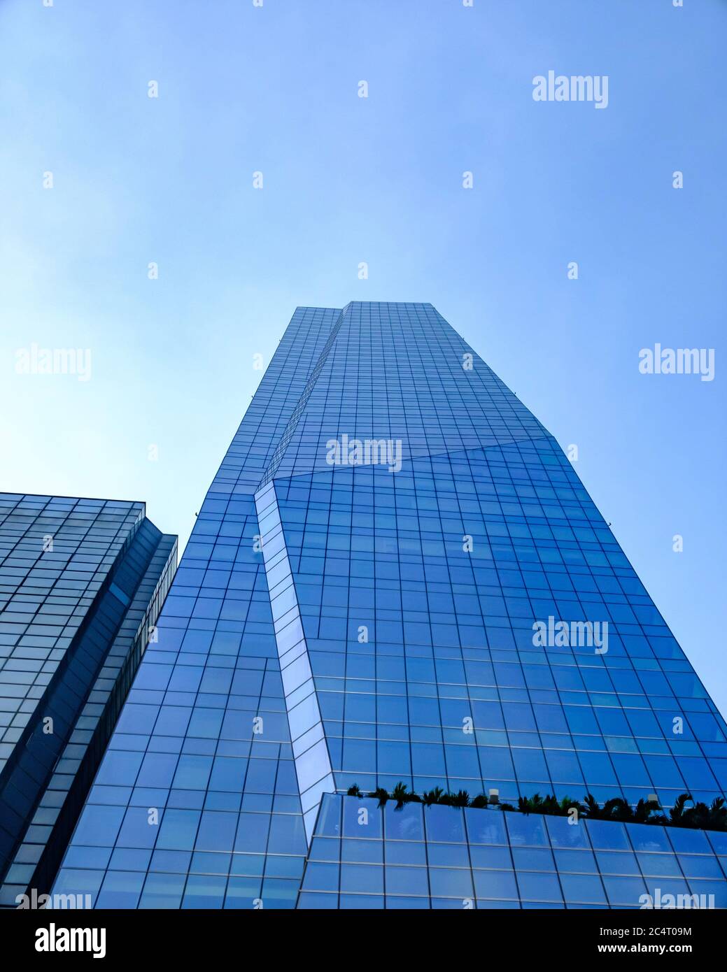 just below the foot of this tall building I look up 90 degrees Stock Photo