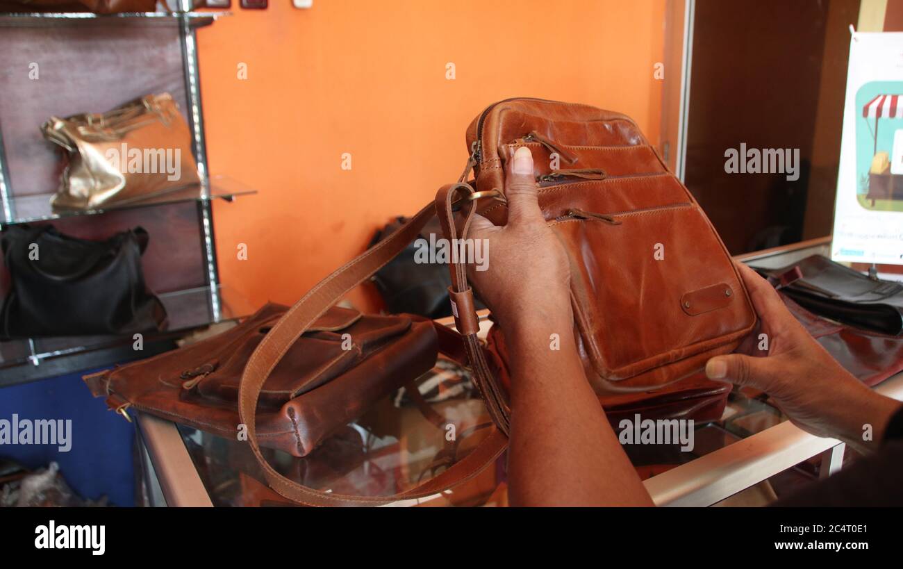 fashion products made from high-quality cow leather from traditional craftsmen in Java, Stock Photo