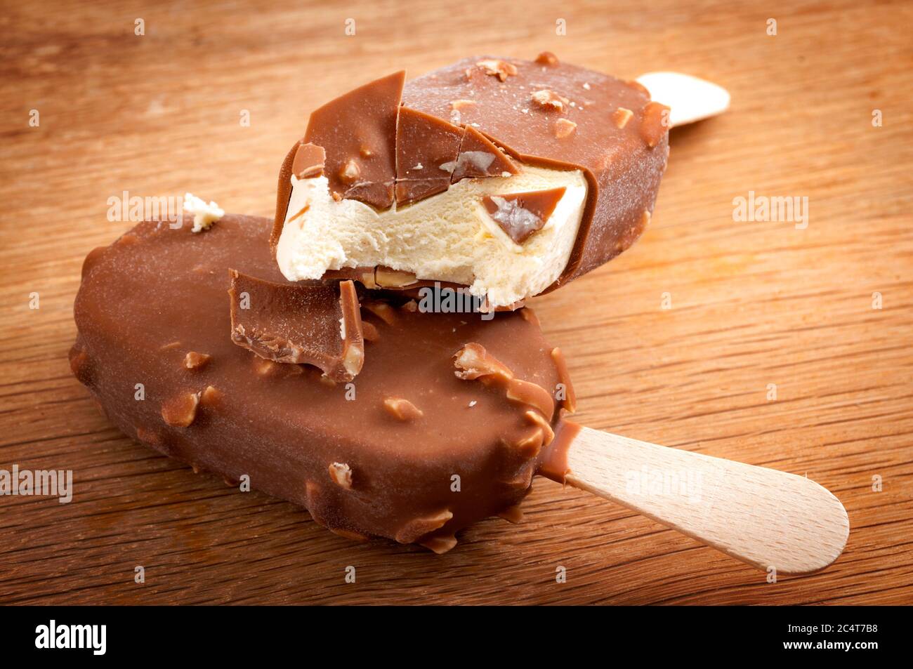 Refreshing summer food, icy cold dessert and frozen snack concept with close up on vanilla, hazelnut and chocolate ice cream bars, stacked together wi Stock Photo