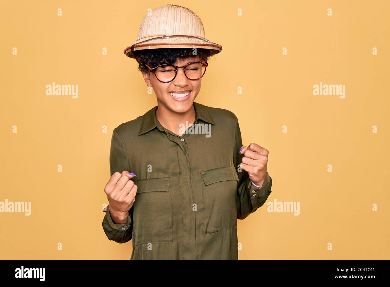 Young beautiful african american tourist woman wearing glasses and ...