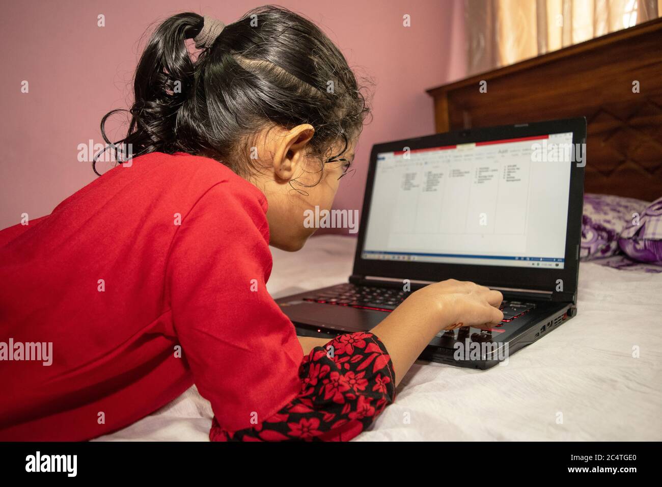 a girl working from home during pandamic covid 19 Stock Photo