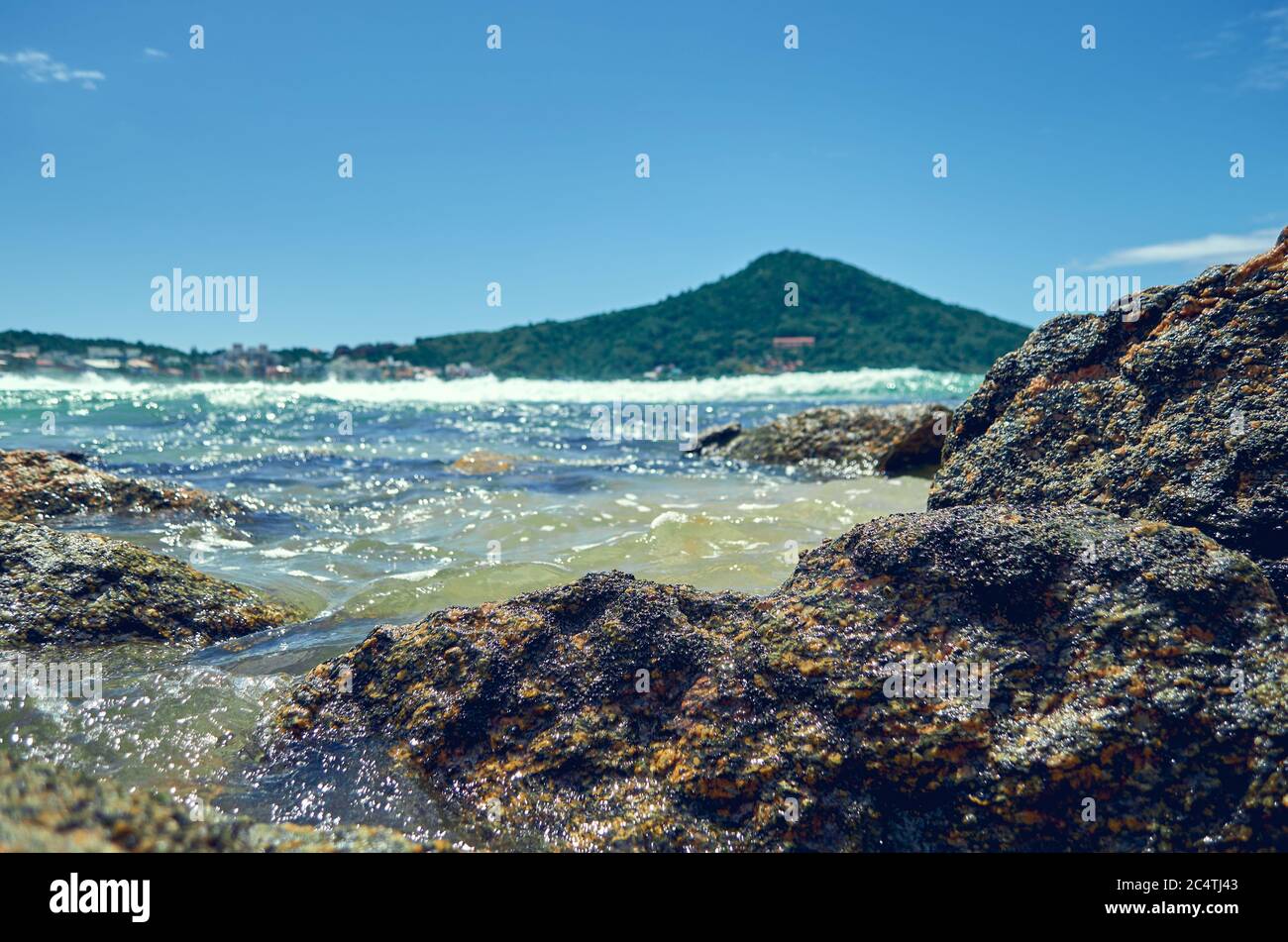 Wave reaching shore rocks hi-res stock photography and images - Alamy