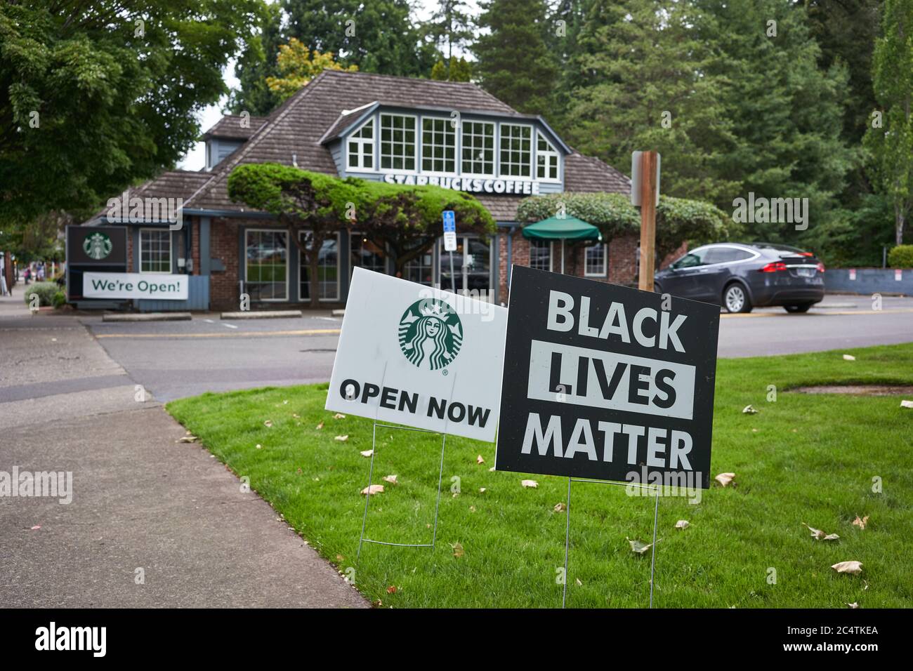 A Black Lives Matter sign is seen outside a Starbucks coffee shop in Lake Oswego, Oregon, on Saturday, June 27, 2020. Stock Photo
