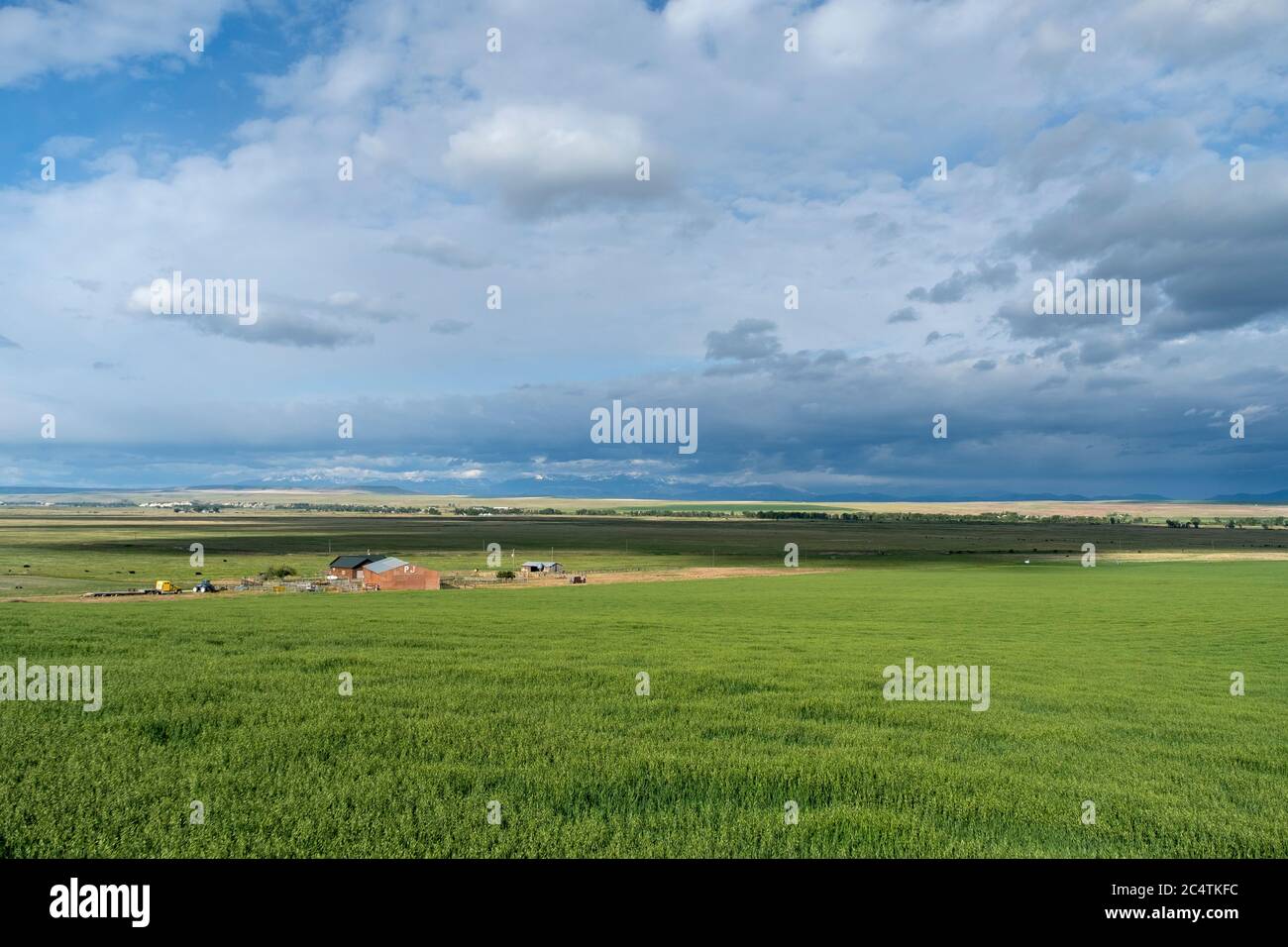 Farm under a dramatic sky in rural Gallatin County, Montana Stock Photo