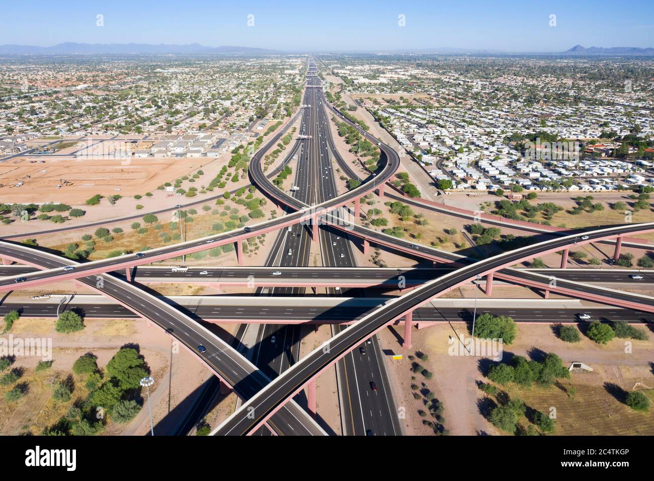 Aerial view of the SuperRedTan freeway interchange of U.S. highway 60 and Arizona loop 202 in Mesa Stock Photo