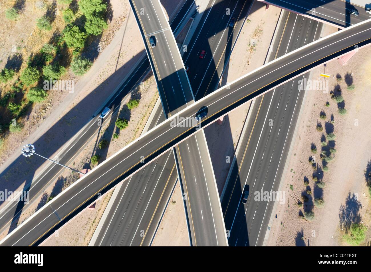 Aerial view of the SuperRedTan freeway interchange of U.S. highway 60 and Arizona loop 202 in Mesa Stock Photo