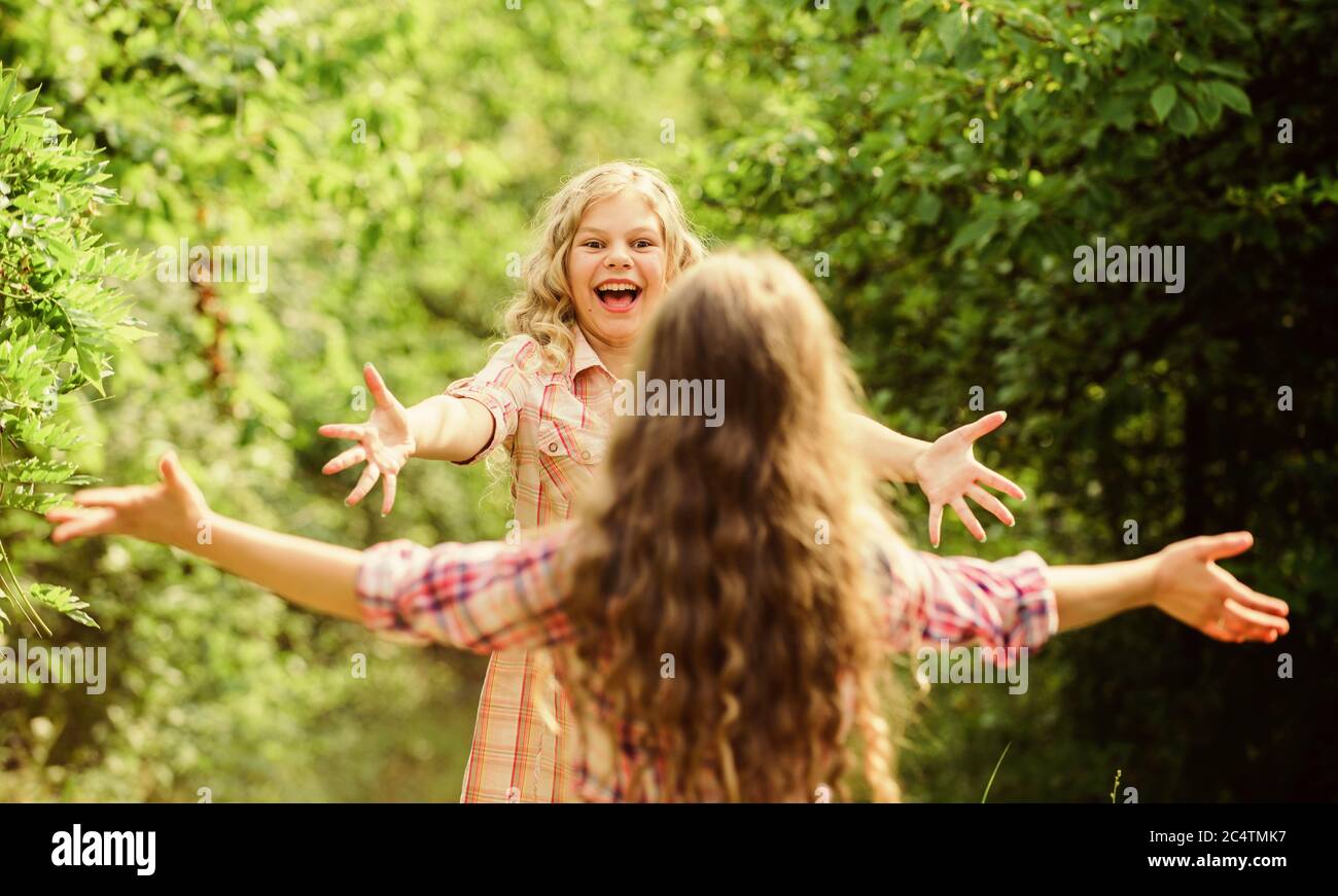 My dear friend. Happy girls excited see each other. Give me hug. Glad to meet you. Finally together. Happy reunion concept. Best friends forever. Happy kids running meet each other. Sincere emotions. Stock Photo