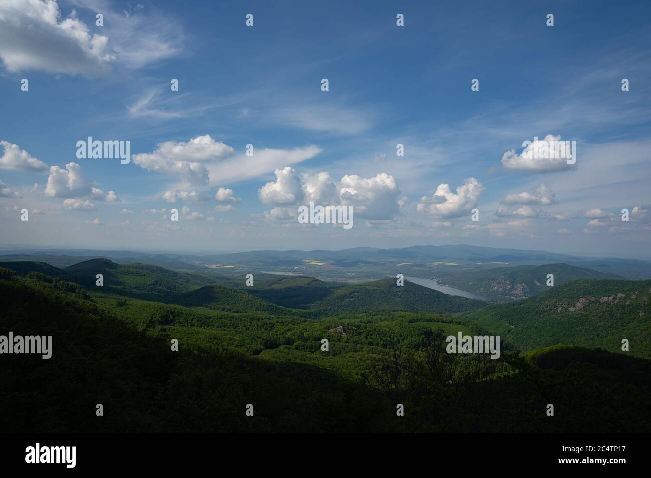 High angle view of the green hills under the cloudy sky Stock Photo - Alamy