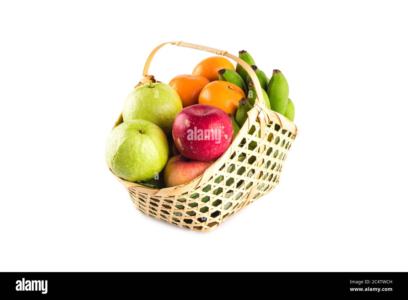 composition variety fruits wicker basket on white background fruit health food isolated Stock Photo