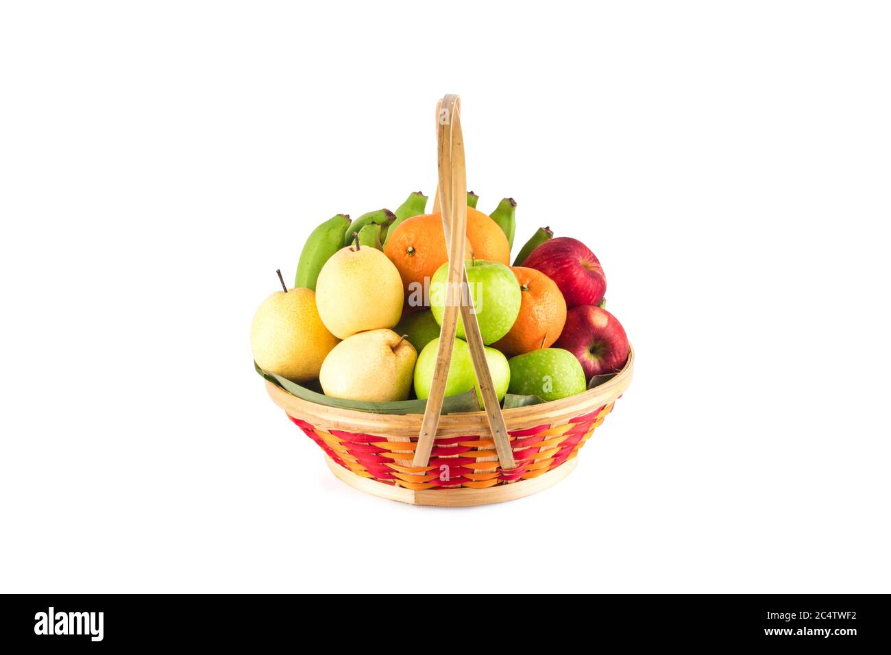 composition assorted fresh fruits such as orange, Chinese pear, banana, red apple and green applein  bamboo wicker basket on white background fruit he Stock Photo