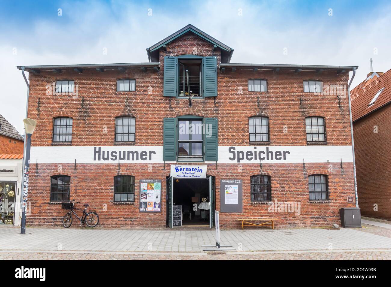 Historic warehouse in the old harbor of Husum, Germany Stock Photo