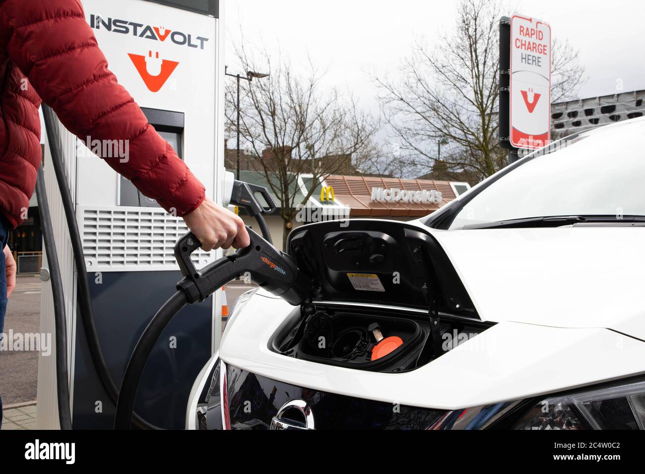 General view of an InstaVolt charger in a McDonald’s carpark, as the food chain announces plans to introduce electric vehicle (EV) rapid charging points as standard across new UK Drive-Thru restaurants, London. Stock Photo