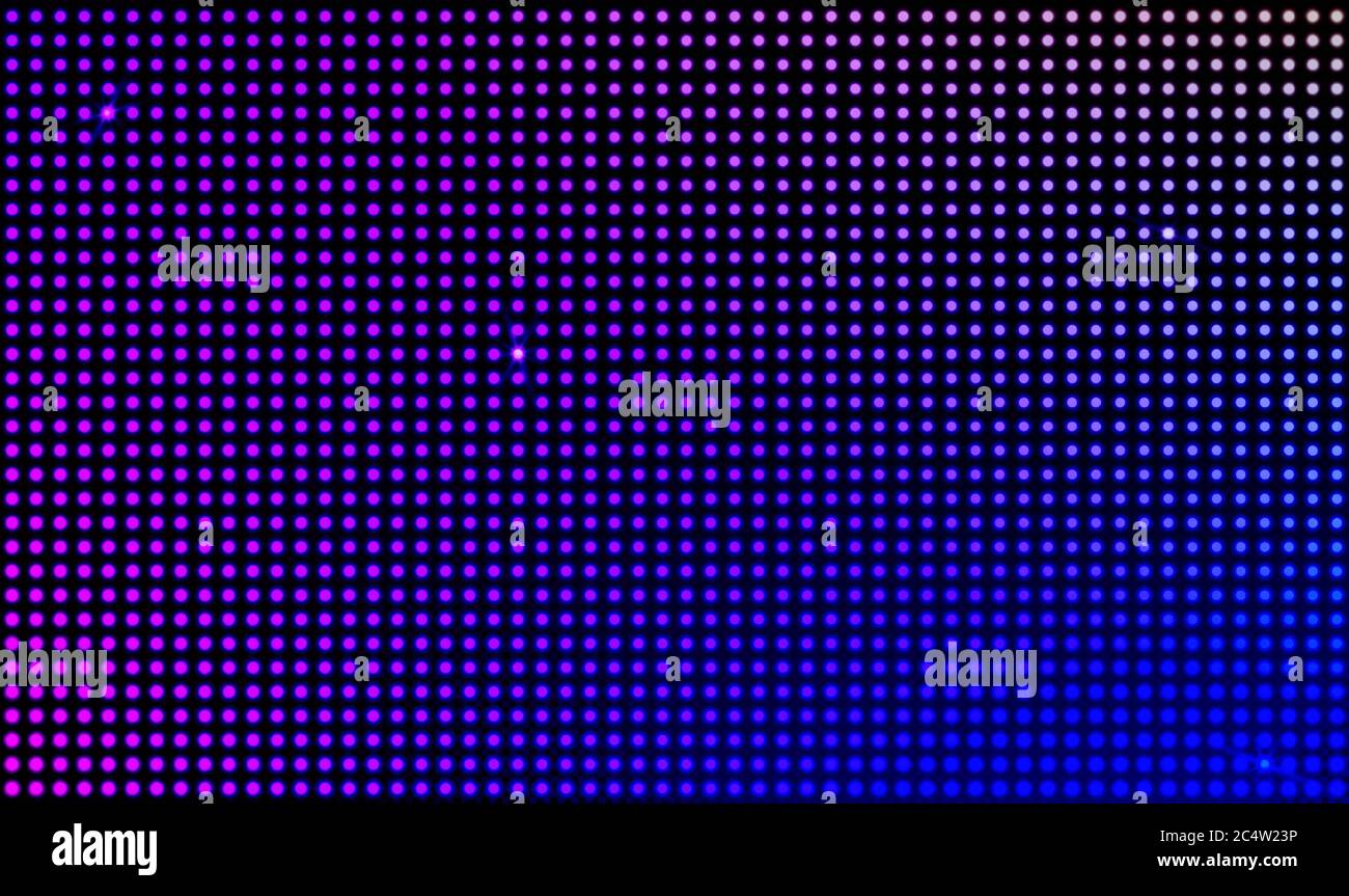 Led wall video screen with blue and purple dot lights on black background.  Vector background with