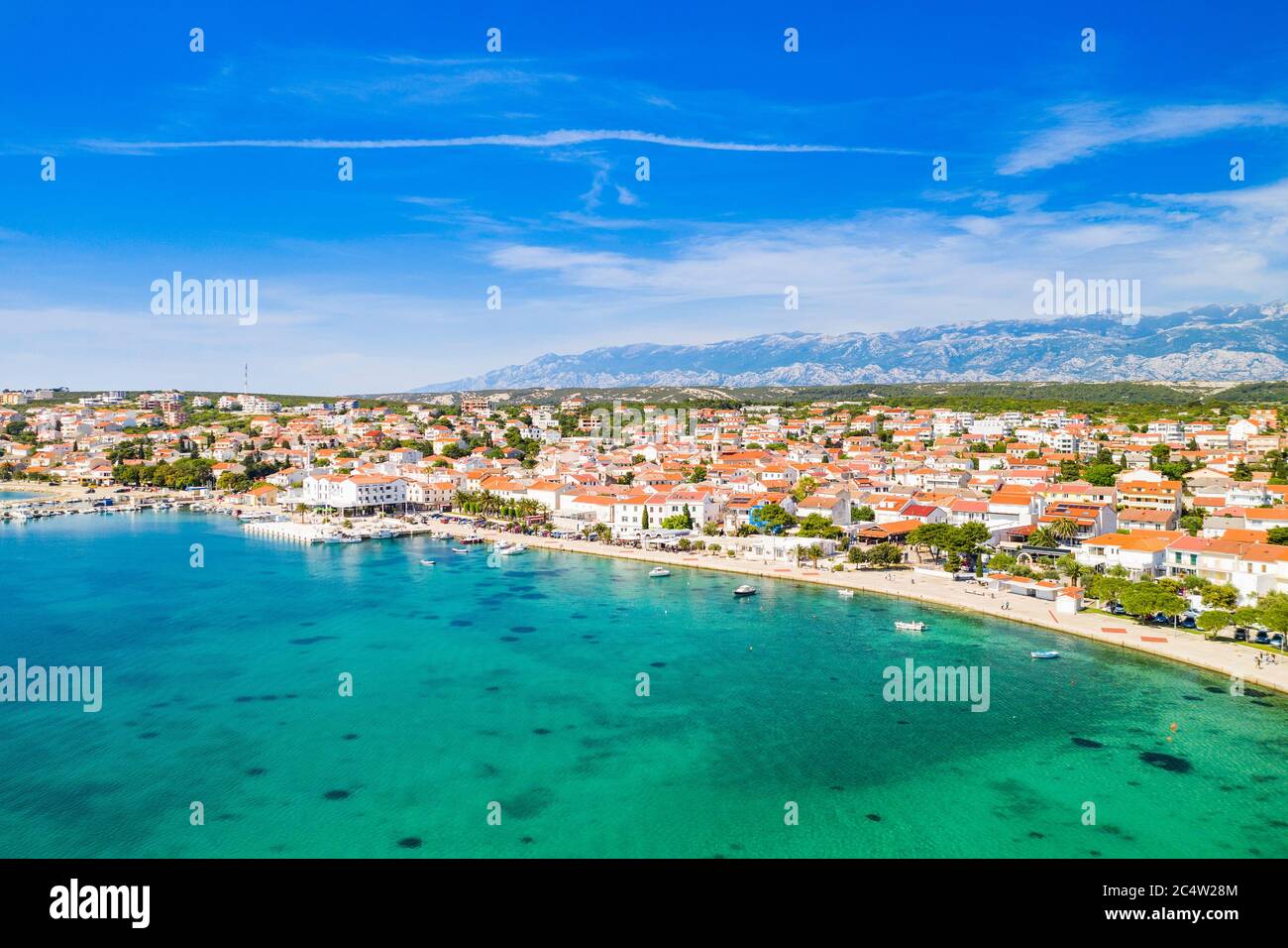 Croatia, beautiful Adriatic coastline, town of Novalja on the island of Pag, city center and marina aerial view Stock Photo