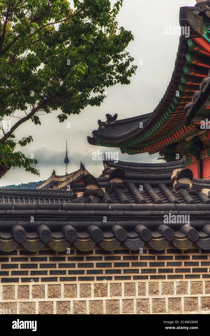 Changdeokgung Palace with Seoul Tower in the background. UNESCO World Heritage Site, Seoul, South Korea, Asia Stock Photo