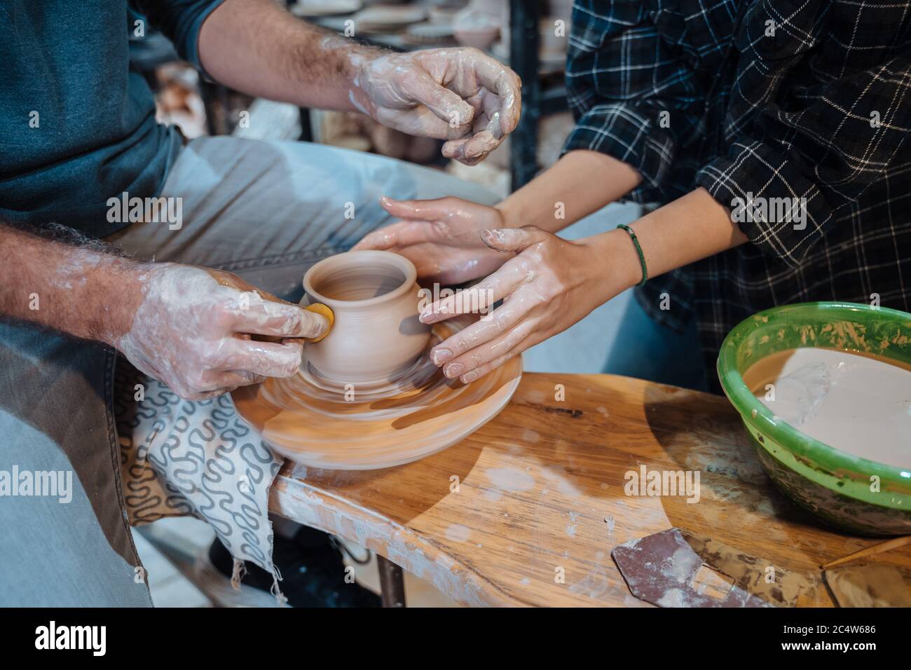 Making a handmade clay pot. Pottery lesson, hobby Stock Photo Alamy