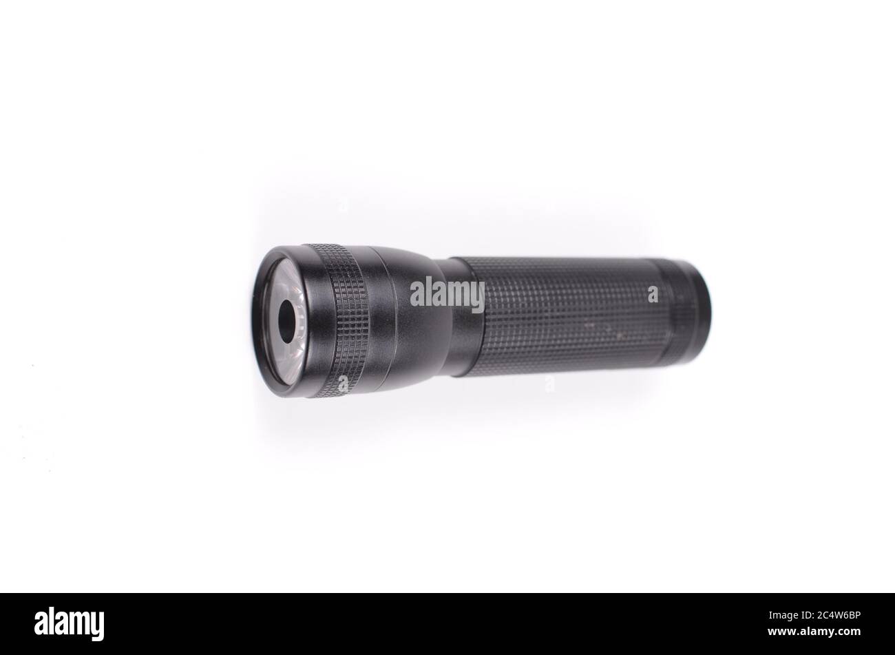 Black flashlight isolated on a white background Stock Photo