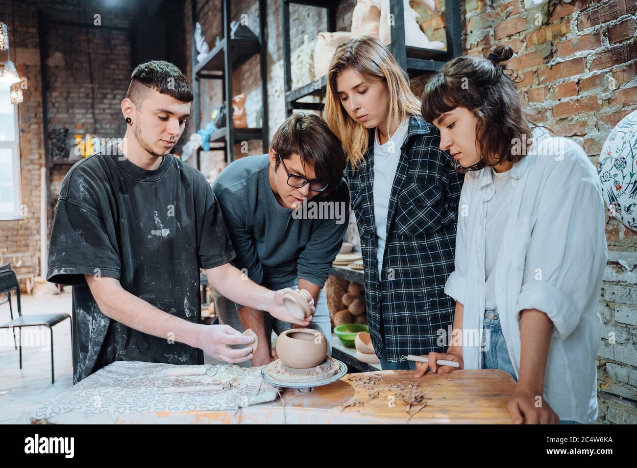 Making a handmade clay pot. Pottery lesson with master Stock Photo Alamy