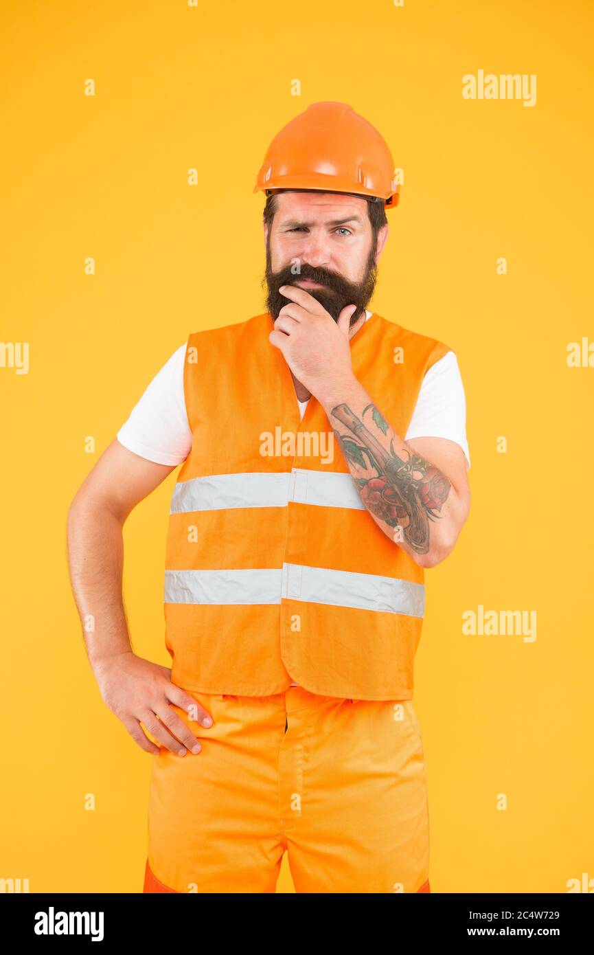 Creative Solutions Man Protective Hard Hat And Uniform Worker Brutal Bearded Builder Confident