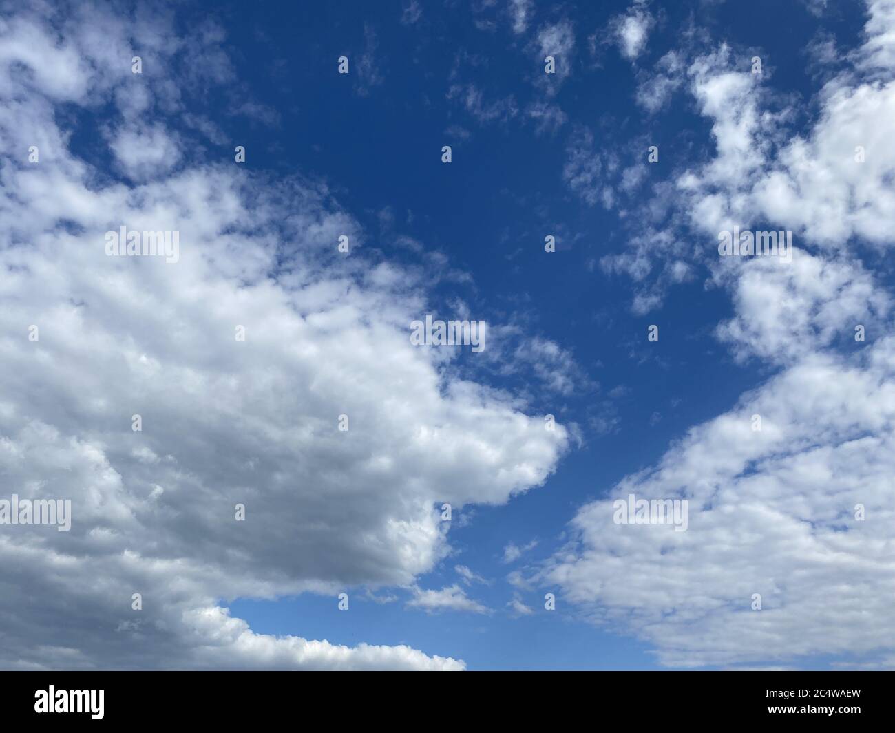Low angle shot of the fluffy clouds on a fresh sunny day - concept ...