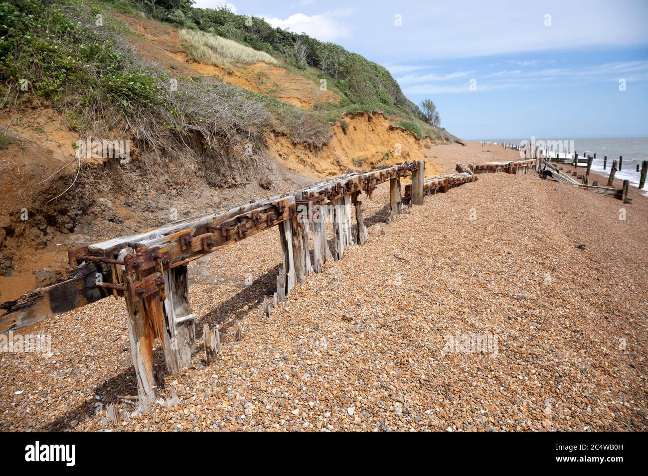 Remnants of old coastal defences and groins most 1940s anti-invasion military structures, Bawdsey, Suffolk, England, UK Stock Photo