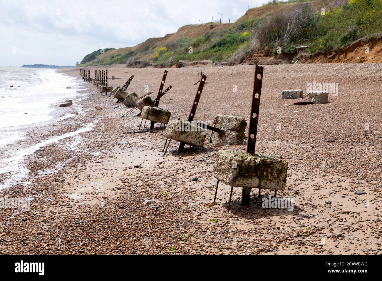 Remnants of old wartime coastal defences 1940s anti-invasion military structures, Bawdsey, Suffolk, England, UK Stock Photo