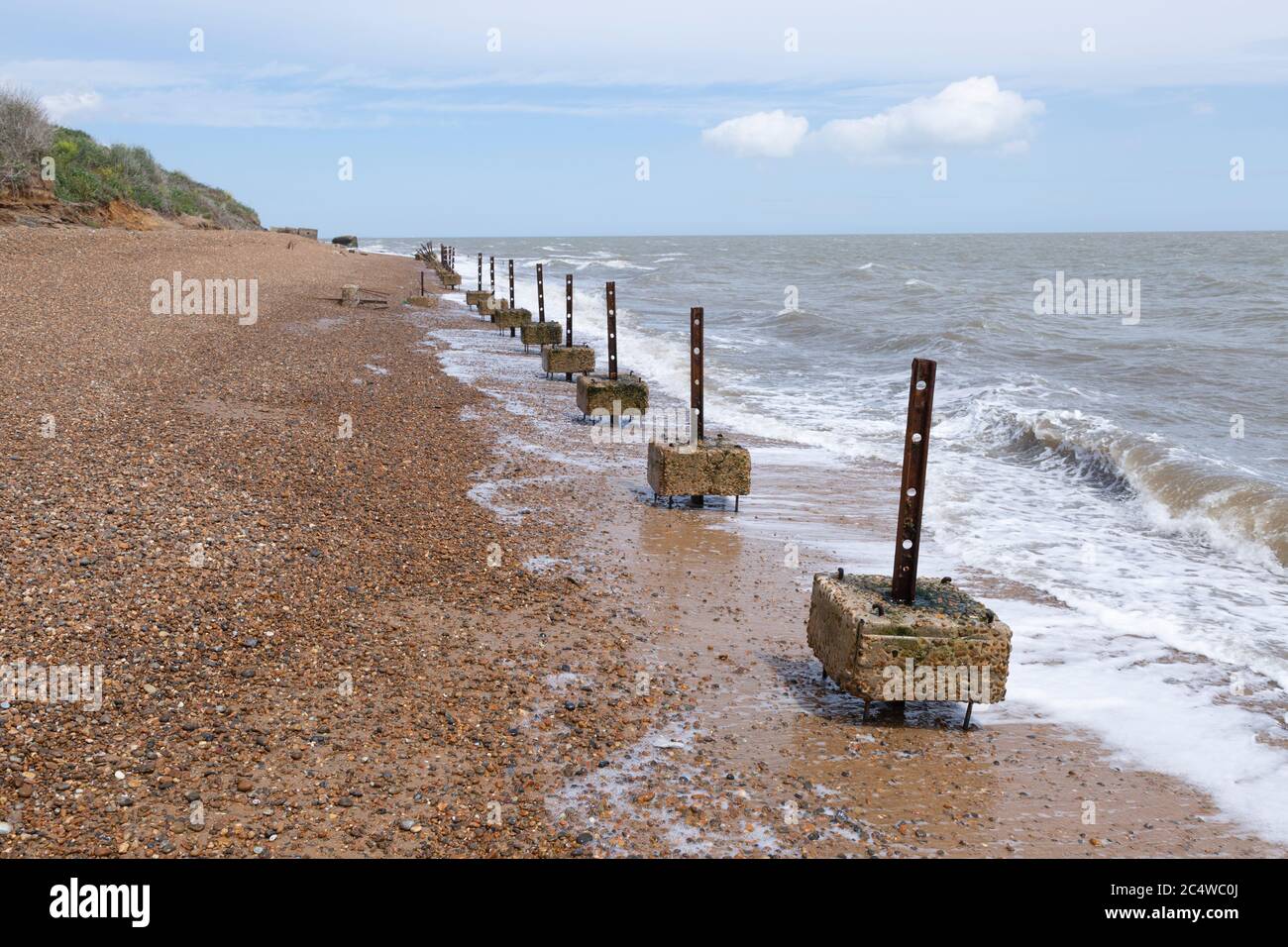 Remnants of old wartime coastal defences 1940s anti-invasion military structures, Bawdsey, Suffolk, England, UK Stock Photo