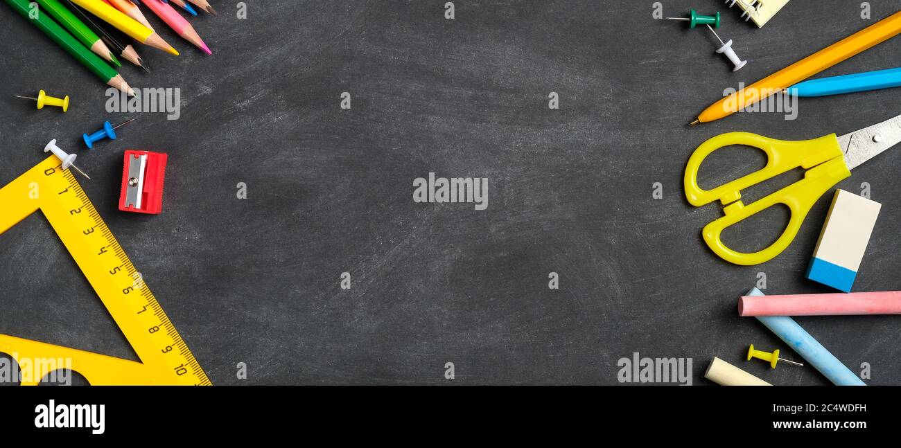 Back to school banner template. Frame of school supplies on black board ...