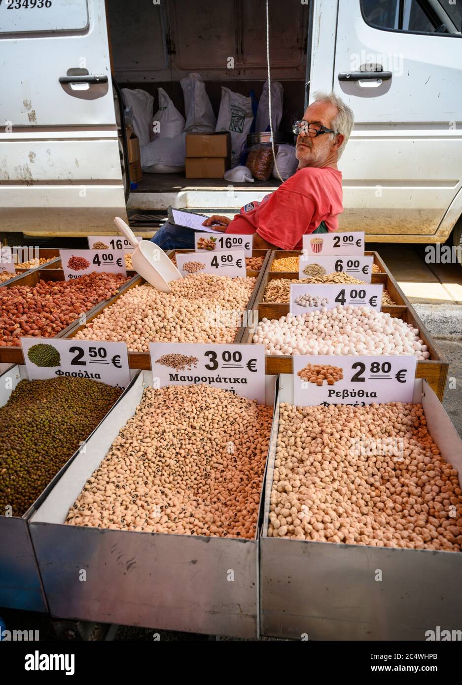 Nuts, beans and pulses for sale at the Sunday market in the small town of Kopanaki, northwestern Messinia, Peloponnese, Greece. Stock Photo