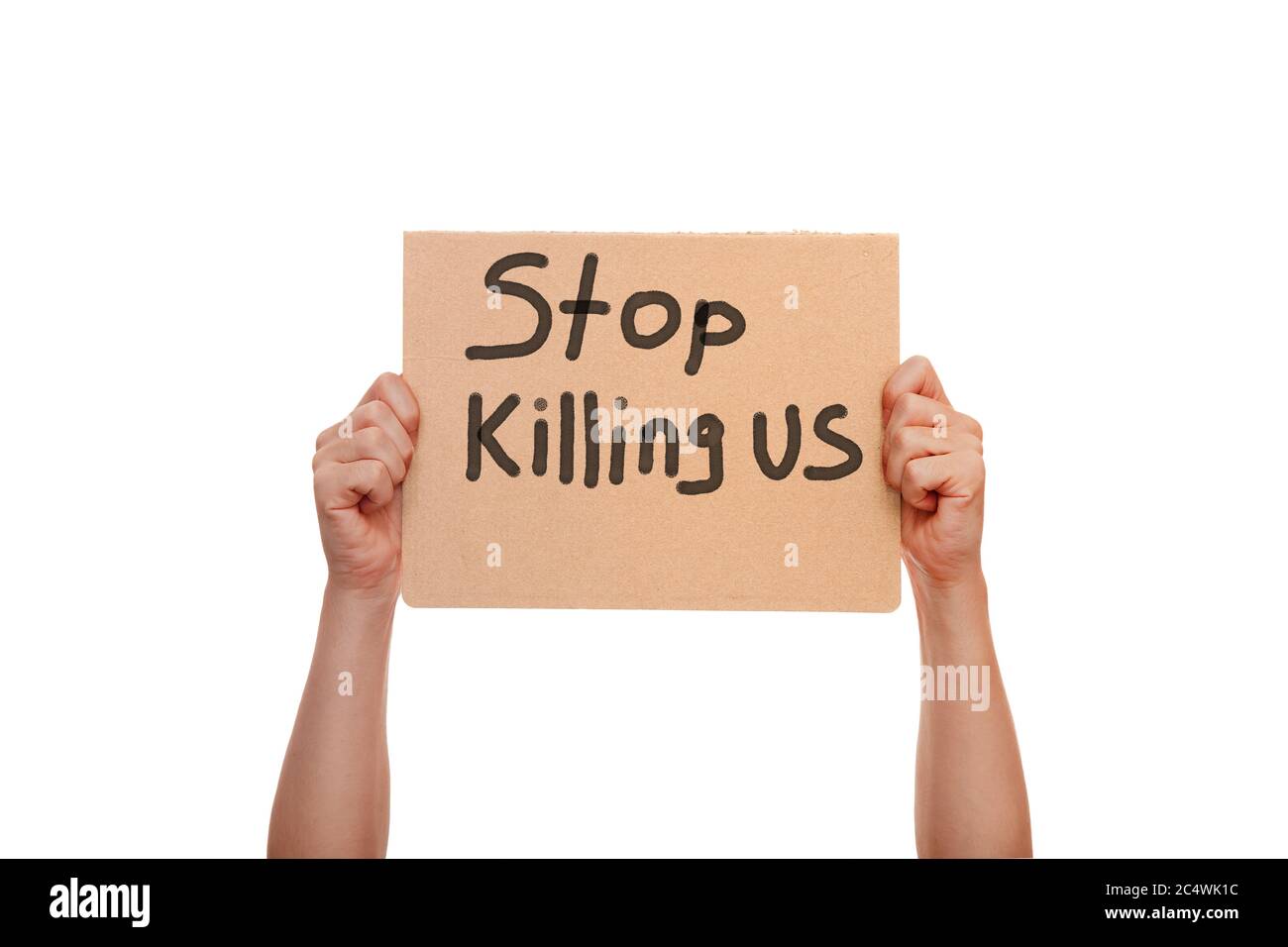 protest poster with the message Stop Killing Us, holding demonstration cardboard with text in hands isolated on a white background, a cononept for the Stock Photo