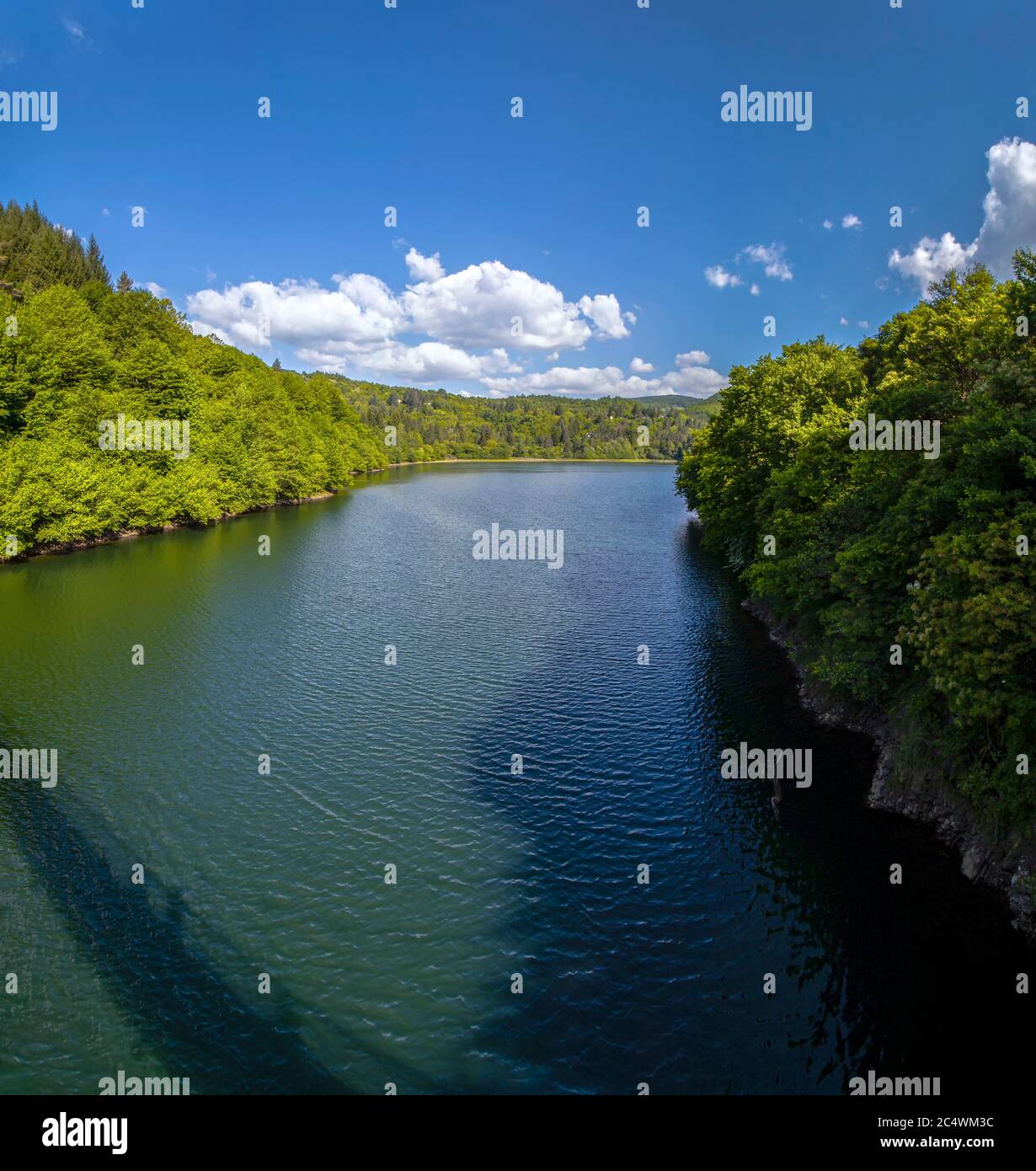 Summertime. The beautiful view from the cable-stayed bridge on the dam. Stock Photo