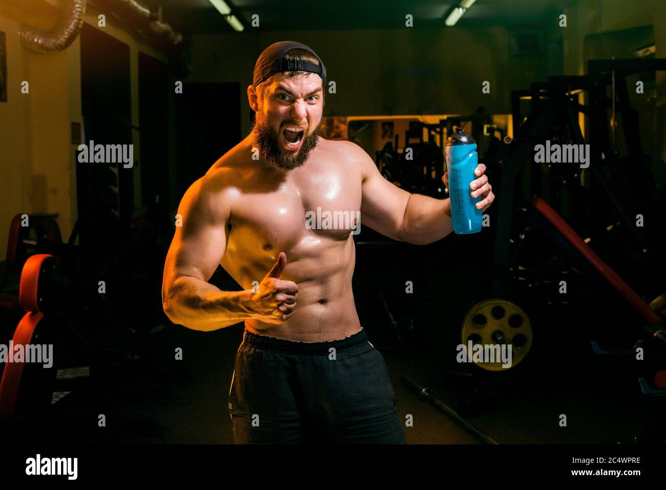 man in the gym with shaker Stock Photo Alamy