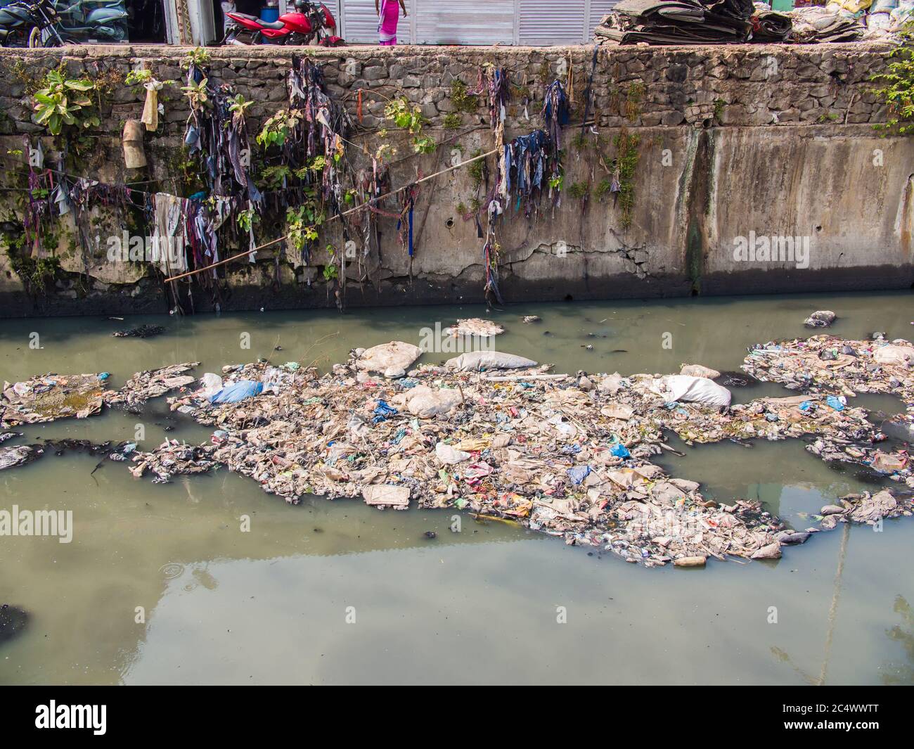 Dirty river in Dharavi slums. Mumbai. India. Stock Photo
