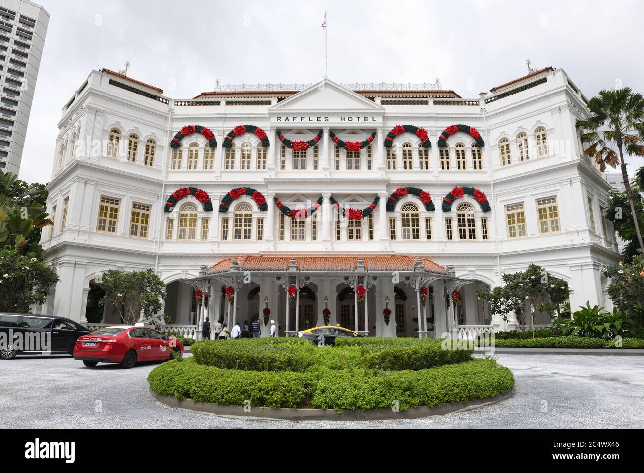 Raffles Hotel exterior decorated for Christmas in Singapore, Asia Stock
