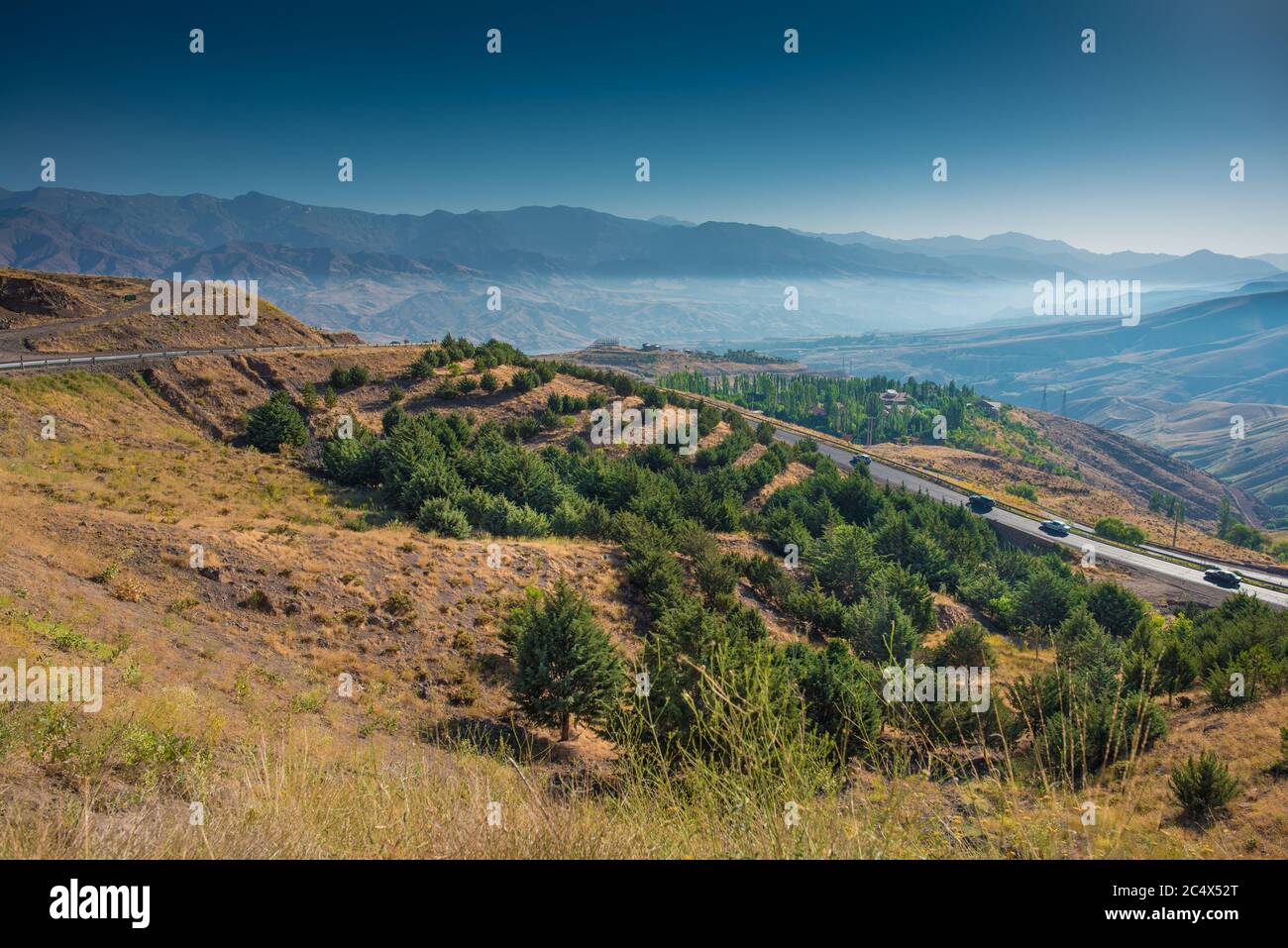 Shot of a road, clicked from a high ground, somewhere in Iran near Karaj Stock Photo