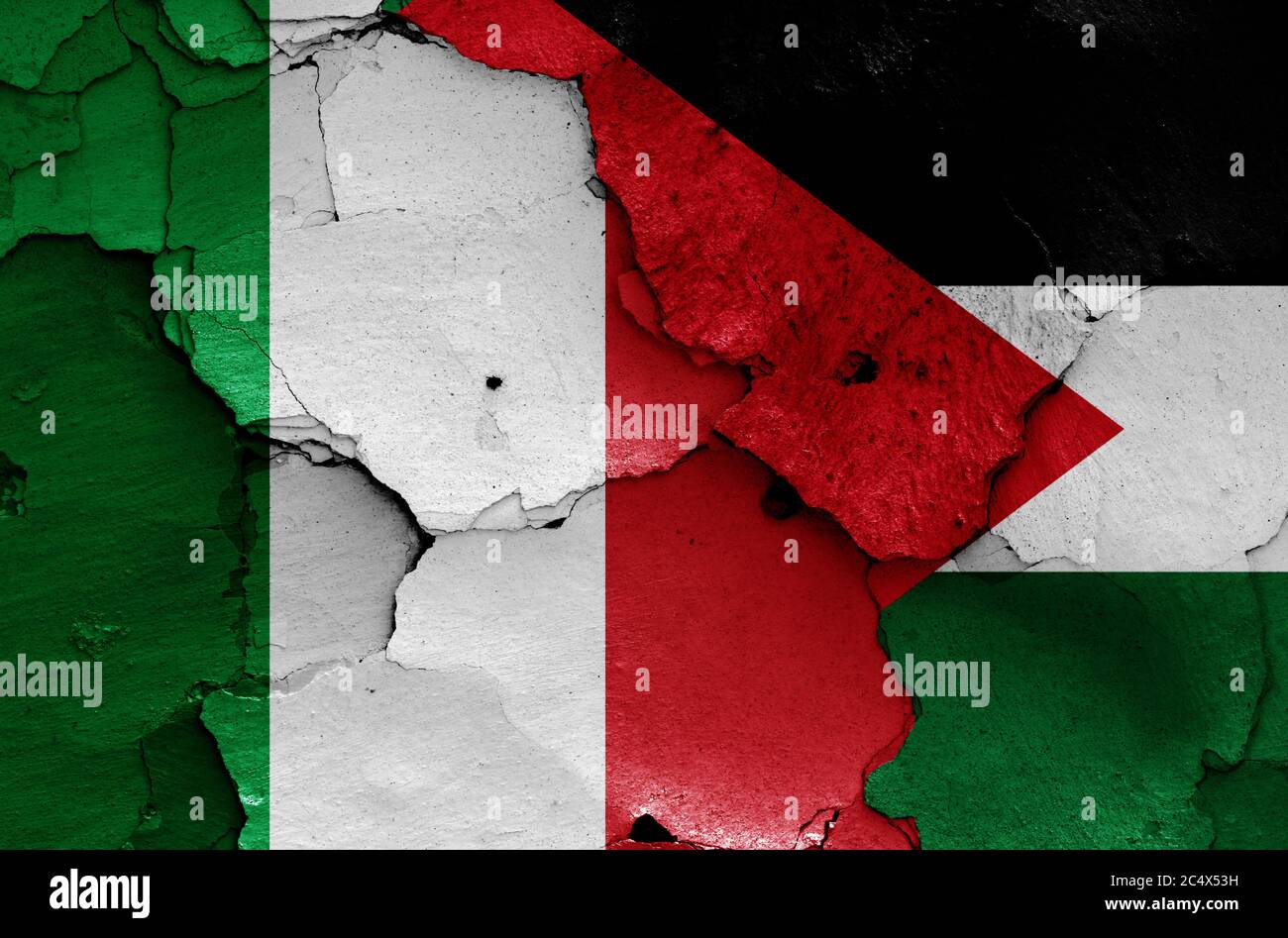 flags of Italy and Palestine painted on cracked wall Stock Photo